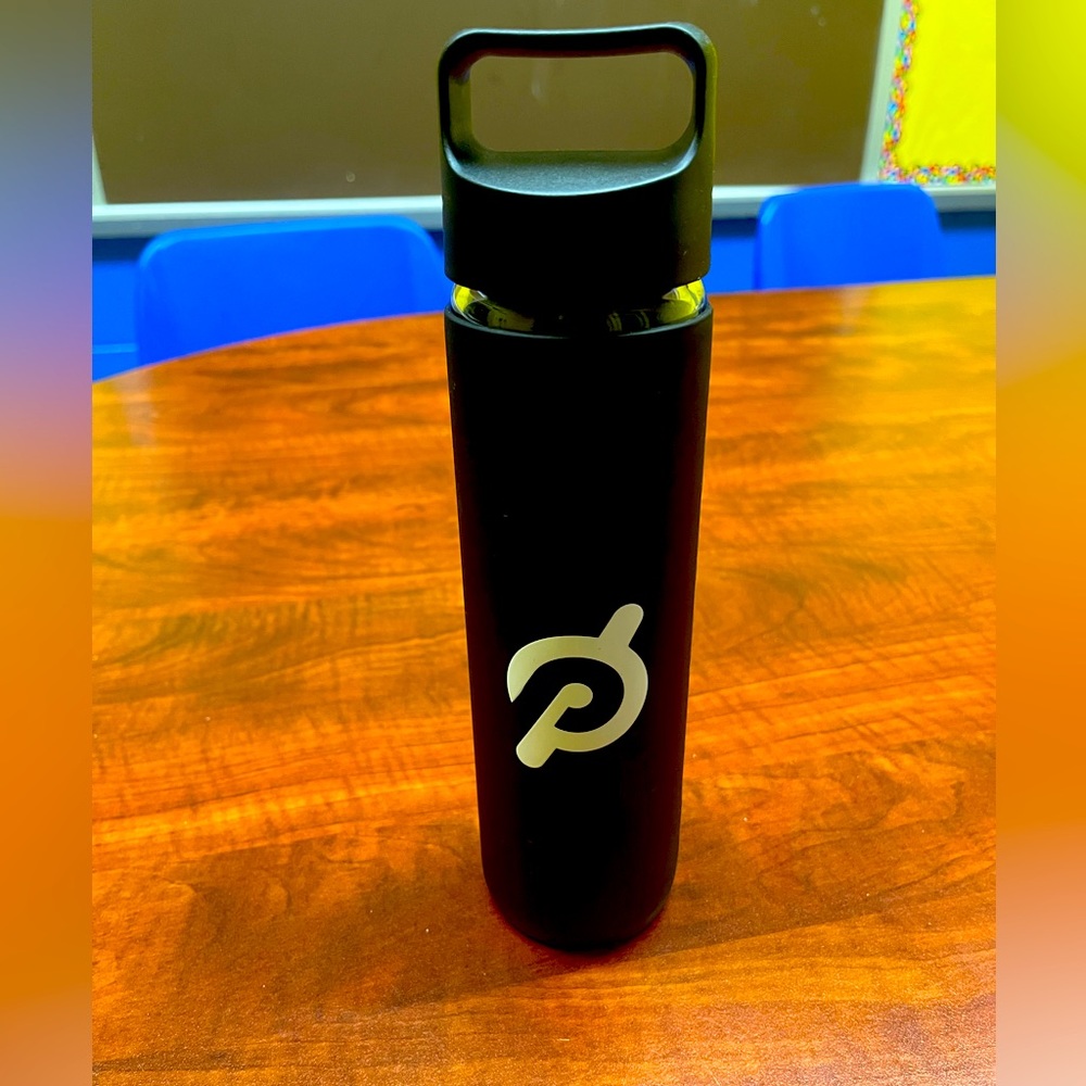 Peloton workout glass water bottle with silicone sleeve